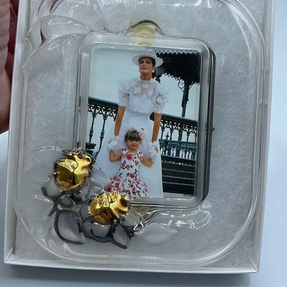 Fifth Avenue Crystal picture frame. Picture size 2.5” x 3.5”